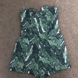 H&M romper with green leaves size XS